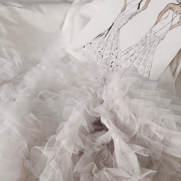 White textile volume and illustrations at the Vikileria Madrid Haute Couture Atelier